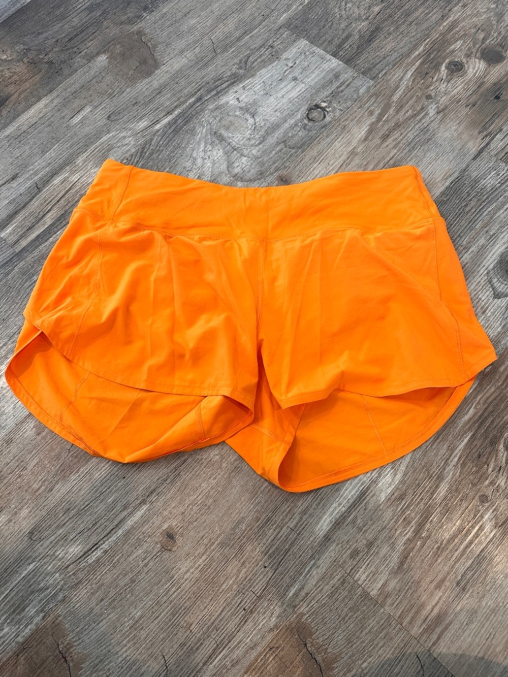 Excellent like new condition Lit Orange lululemon speed up shorts sz 14
